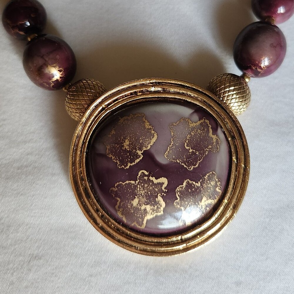 Carol Dauplaise Statement Necklace | Gold Tone & Eggplant Medallion